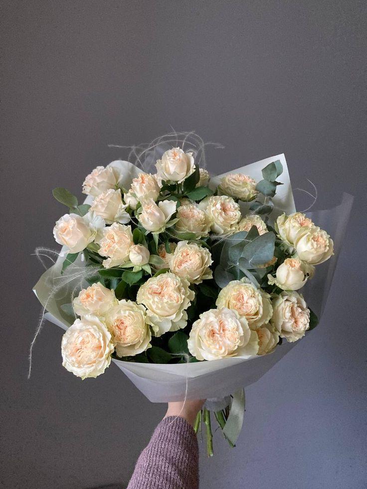 Professional floral arrangement in modern corporate setting